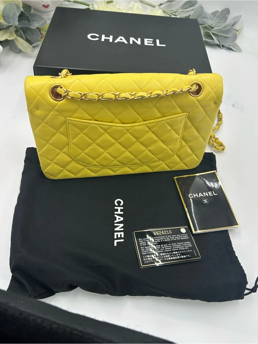 Women's Chanel Classic Quilted double Flap Bag in Yellow with Gold Hardware